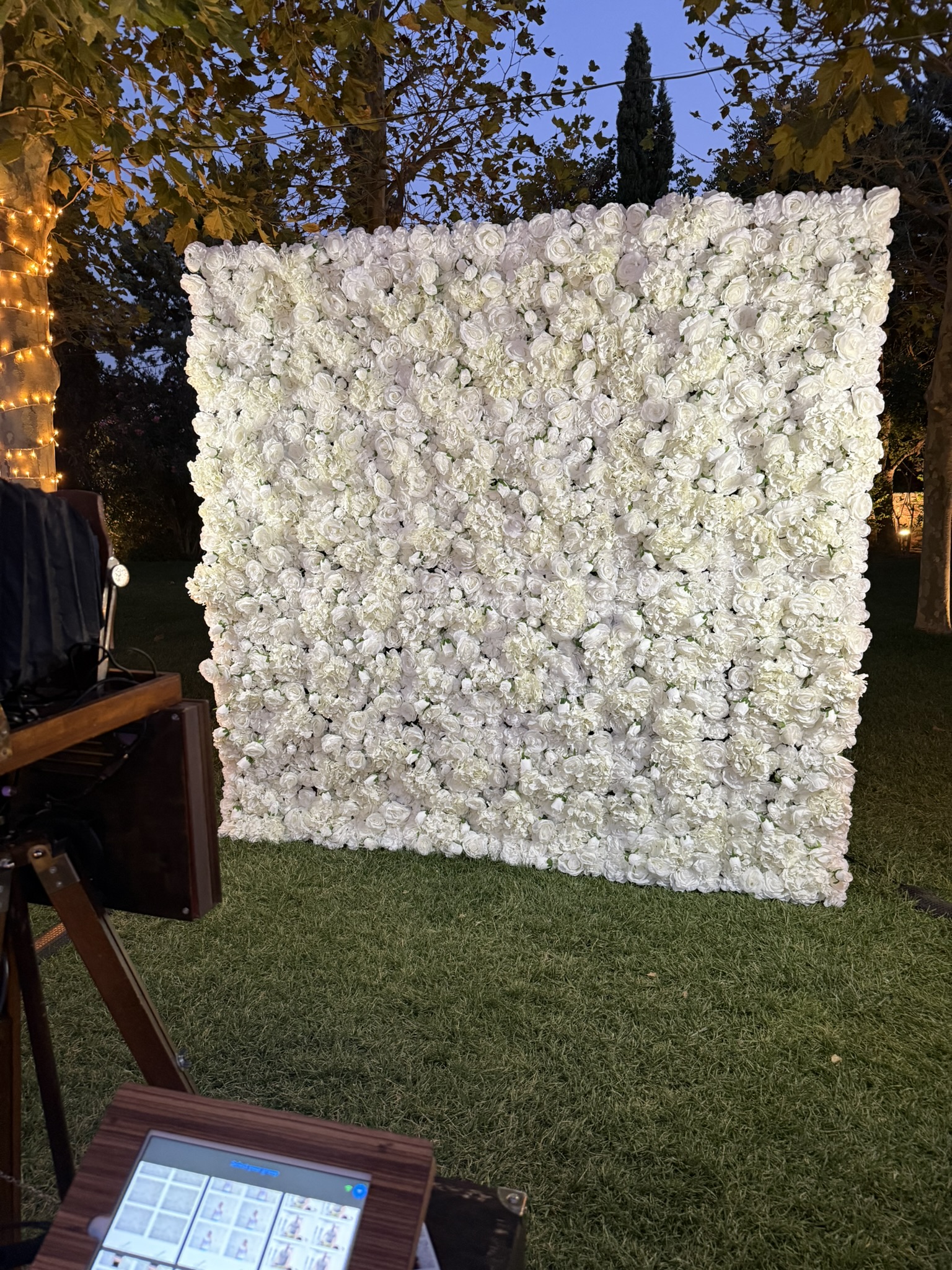 white floral backdrop set up_onephotobooth